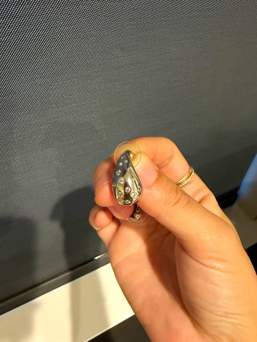 Silver tone metal stud - tone,